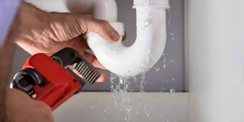 Man Fixing Leaky P Trap with Pipe Wrench | Monkey Wrench, Sewer & Drain | Best Toilet Repair in Utah