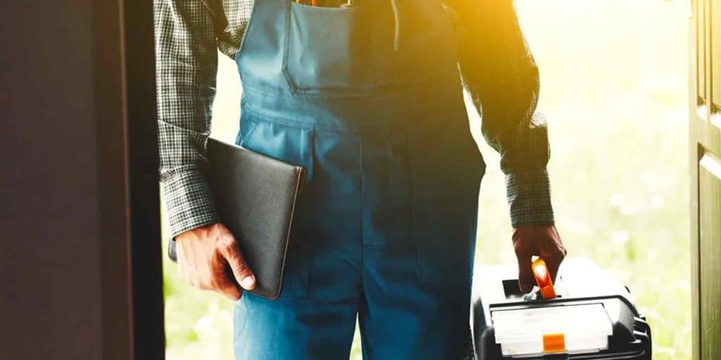 Repairman in Overalls with a Toolbox and Notebook | Professional Plumbers in Salt Lake City | Financing Plumbing Repair