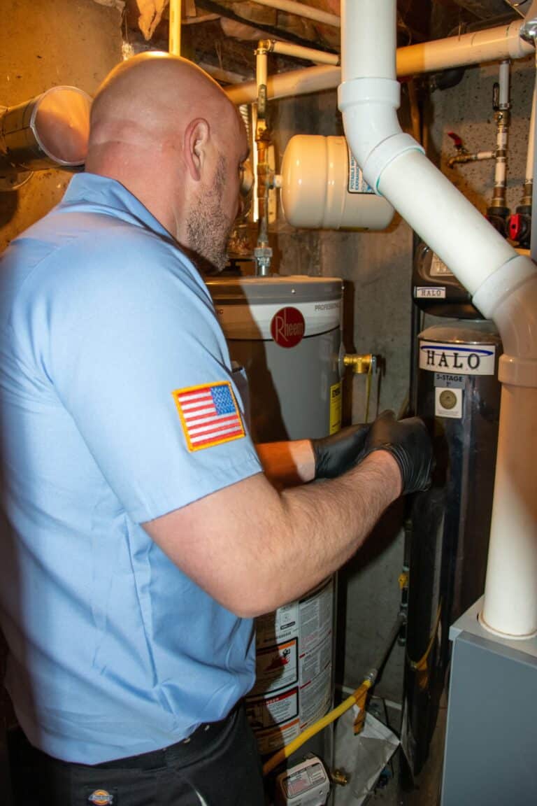 Water Heater Installation and Repair Image of Monkey Wrench Plumber Image 1